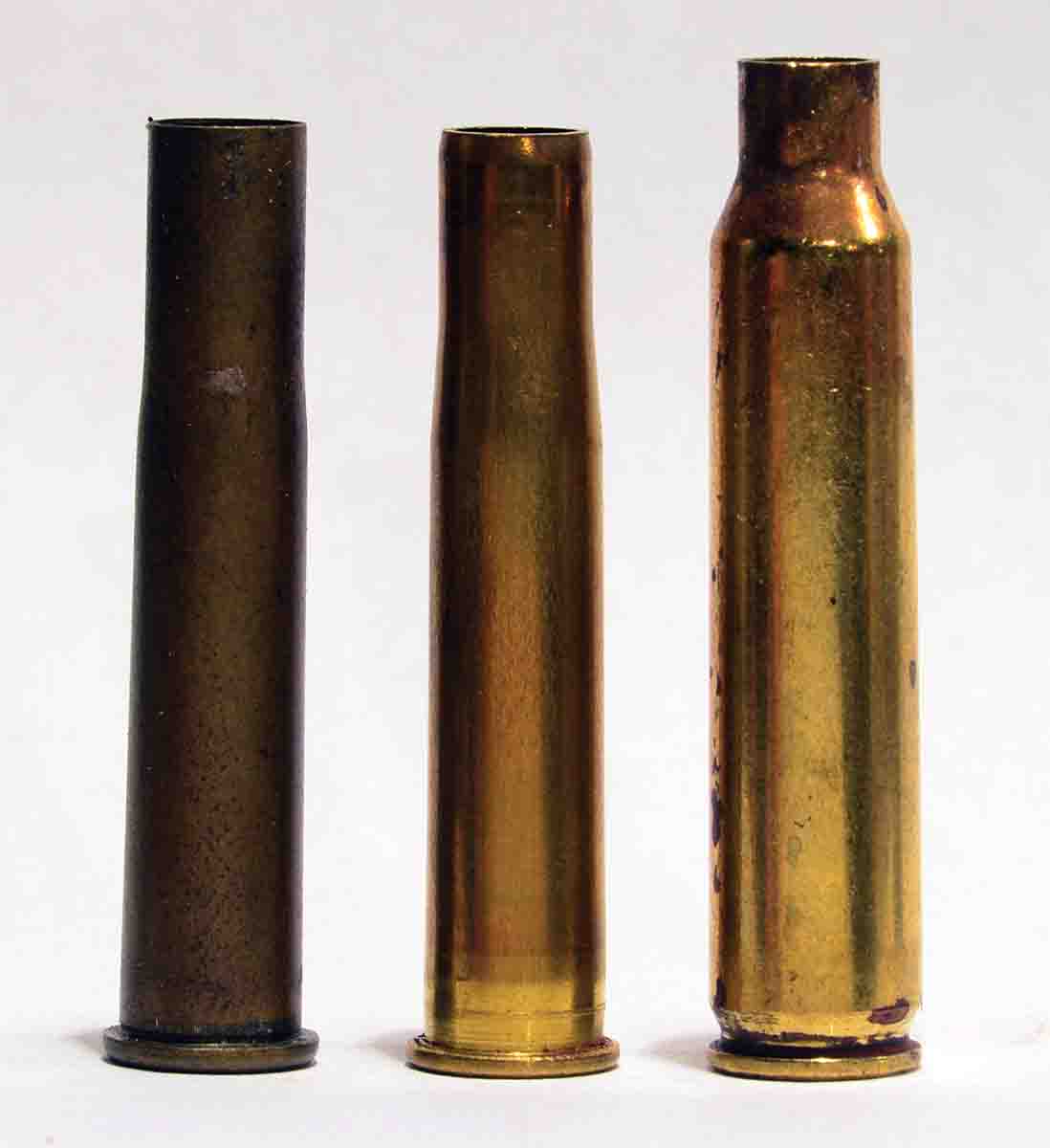 At left is an original .25-20 SS case beside a (center) re-formed Hayley case and a (right) .223 Remington, from which it is swaged. Drastic resizing occurs, resulting in some dimensional anomalies. Note how the mouth of the formed case turns inward. This must be corrected before sizing and loading.